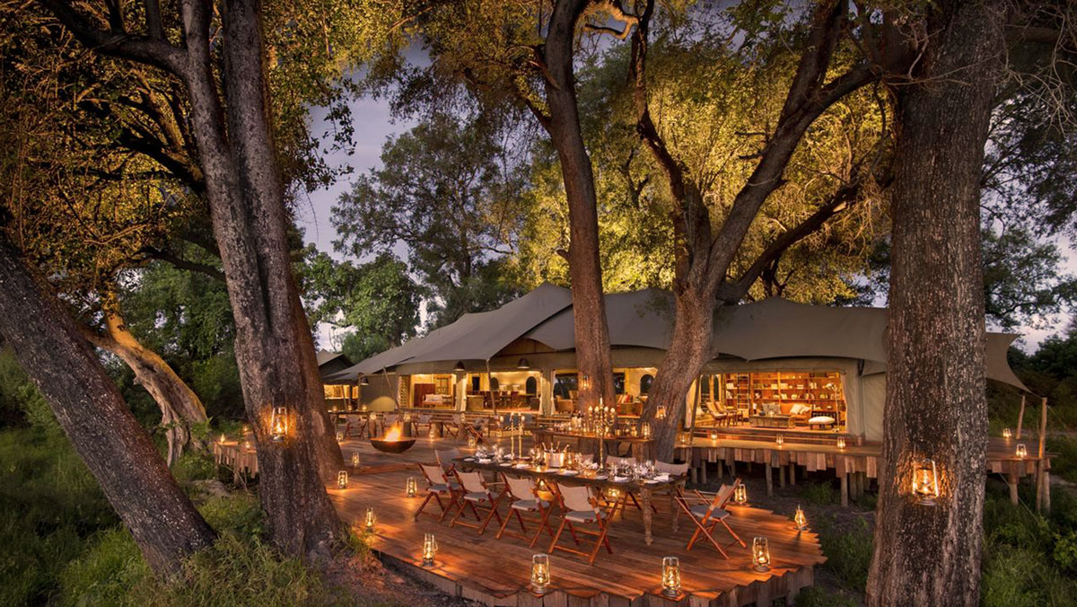 Outdoor dining deck lounge at Duba Plains